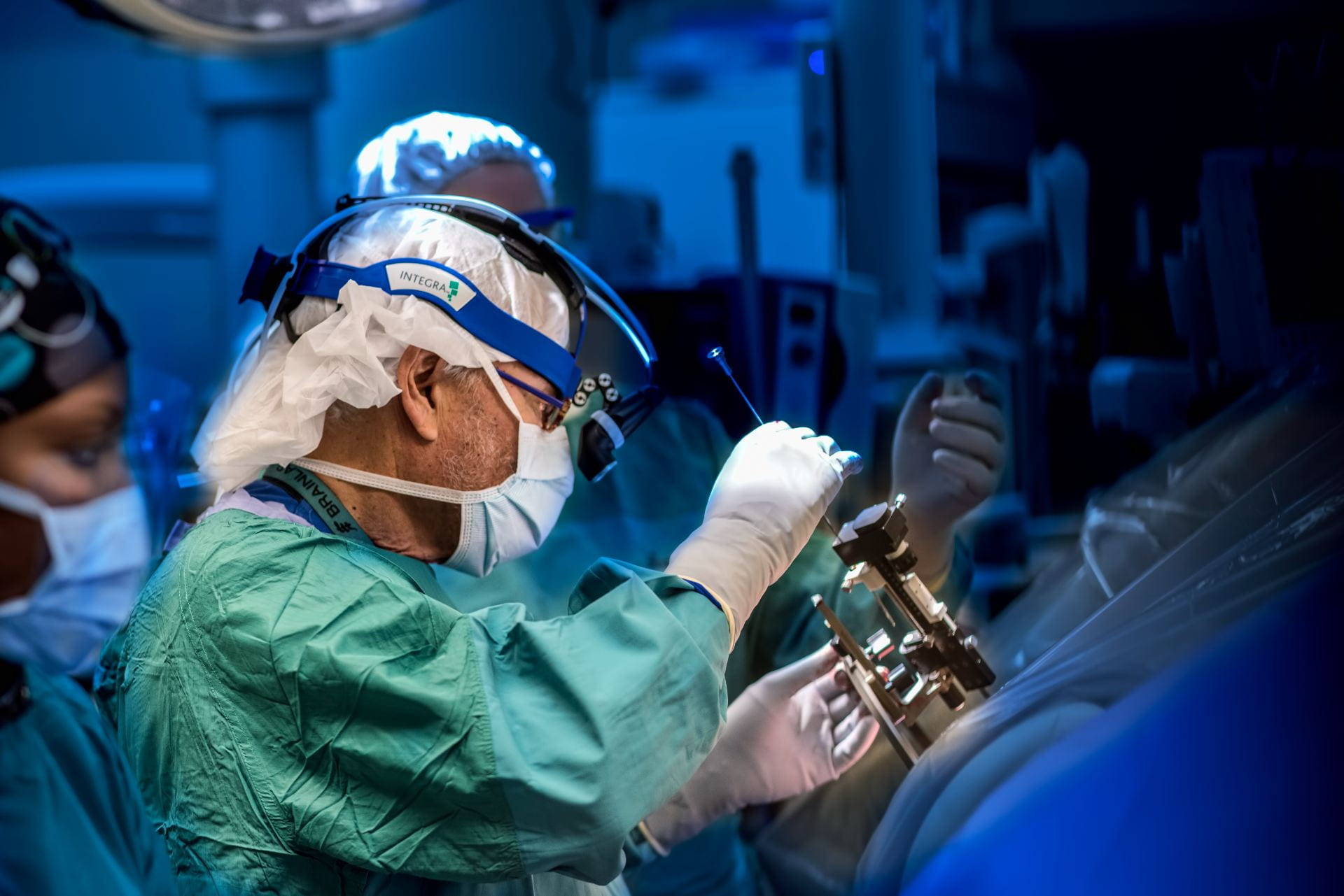 Neurosurgery performing a procedure on a patient